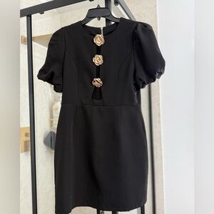 Elegant Black Dress with Gold Floral Accents